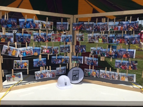 Photos clipped on lines at a charity event