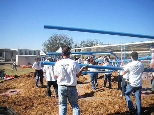 Workers constructing playground