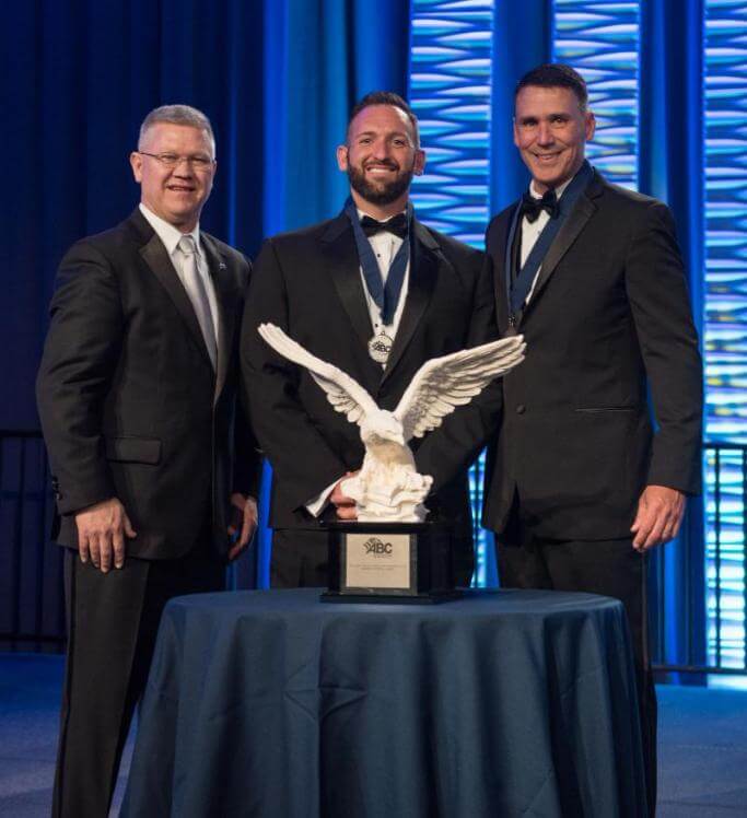Danny LaGrange and Chris Black accepting Eagle Award