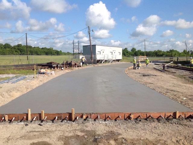 a freshly poured concrete road
