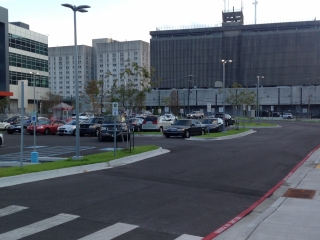 IMG_0453 a wide shot of the brand new parking lot with cars parked in the spaces