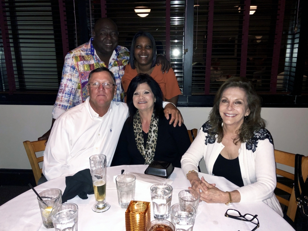 a group of employees at a celebration dinner