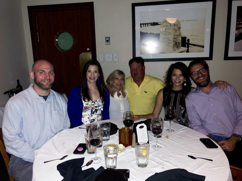a group of employees at a celebration dinner