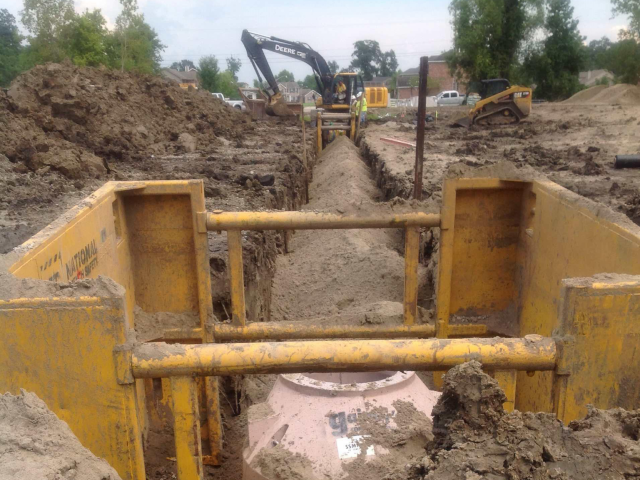 a view of a jobsite from inside a trench